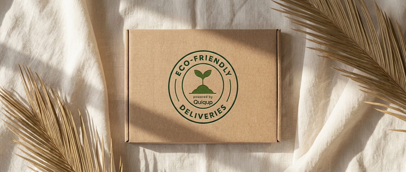 A branded Eco-Friendly Deliveries mailer box sealed with a wax stamp